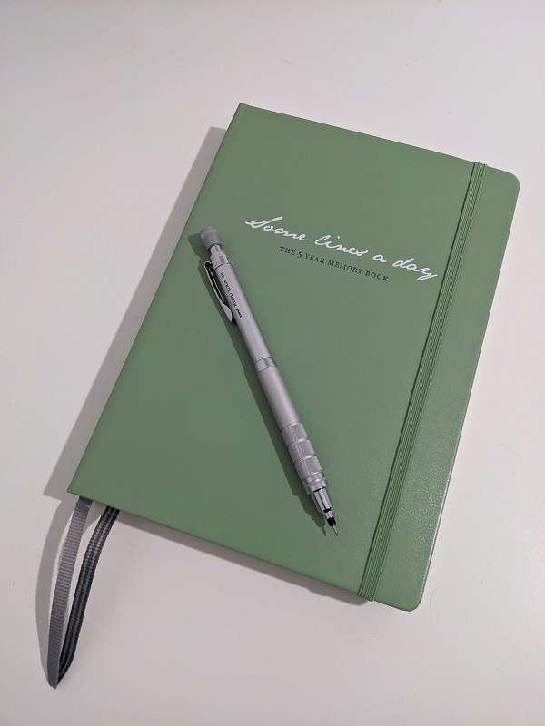 Photograph of a green five year diary by Leuchtturm
